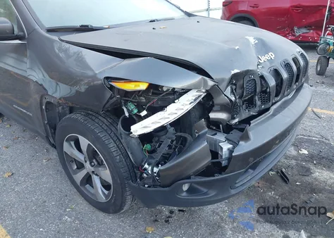 2014 Jeep Cherokee North z USA, uszkodzony, nr VIN 1C4PJMCS0EW284735